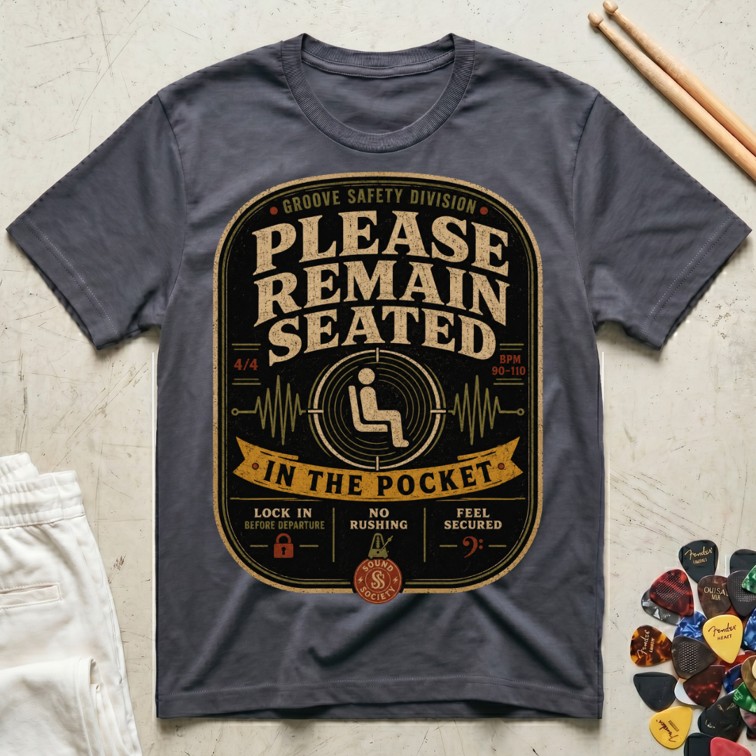 Please Remain Seated In The Pocket T-Shirt