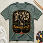 Please Remain Seated In The Pocket T-Shirt