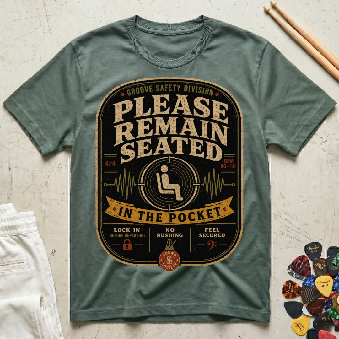 Please Remain Seated In The Pocket T-Shirt