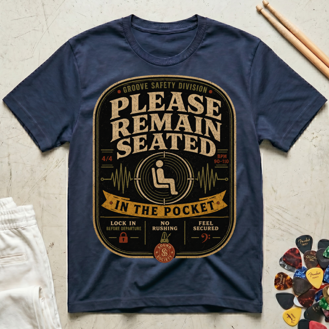 Please Remain Seated In The Pocket T-Shirt