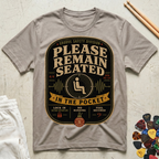 Please Remain Seated In The Pocket T-Shirt